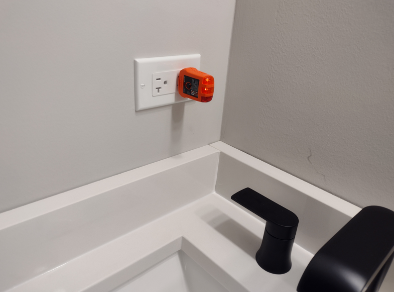 GFCI Tester in required bathroom bowl outlet.