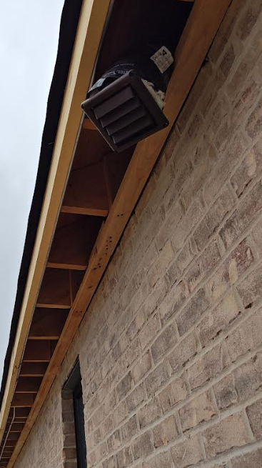 Bathroom exhaust fan code requirements: UL 181–listed flex duct and vent installed for code compliance.