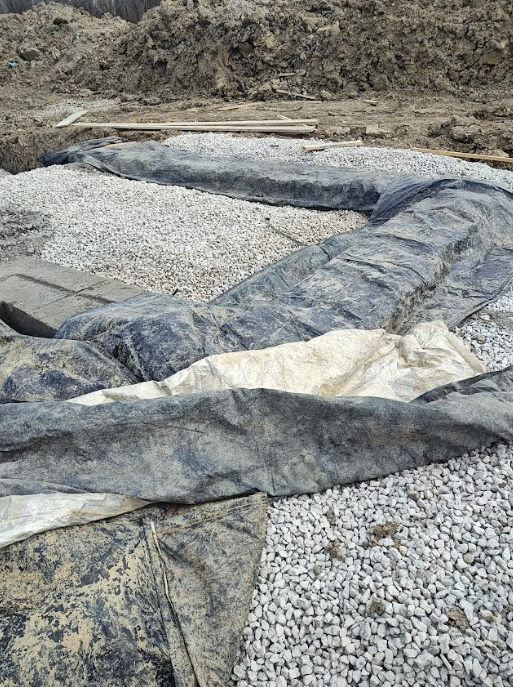 Footings protected with insulated blankets for cold weather curing in Zone 5 jobsite