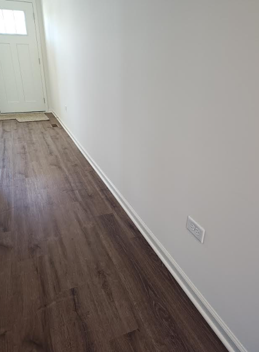 Residential hallway over 10 feet long with required electrical receptacle per NEC 210.52(H).