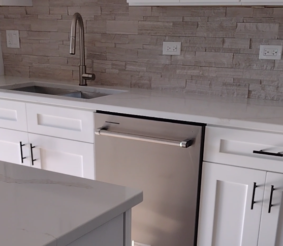 Kitchen receptacle spacing per NEC 210.52(A) – example outlet placement.