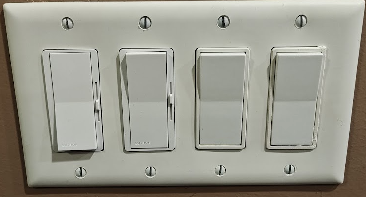 Two Lutron Diva dimmer switches in a wall plate, standard two-wire setup—LED dimmer strobing fix example
