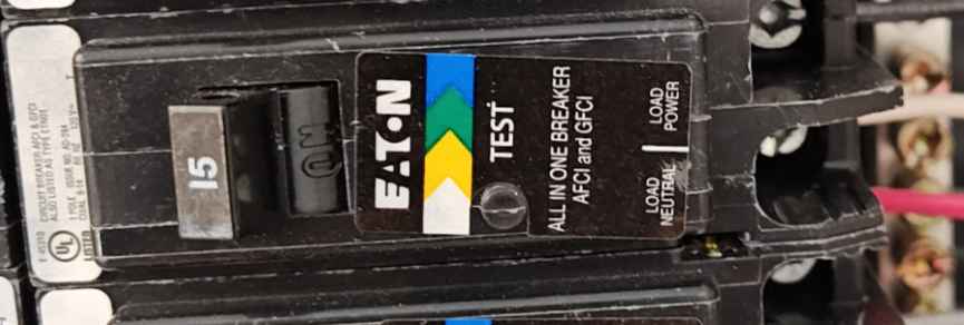Eaton dual function AFCI/GFCI breaker providing both arc fault and ground fault protection in a residential panel.