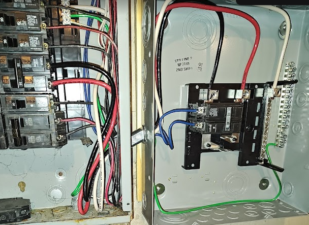 Subpanel feeder bonding NEC 2023 showing isolated neutral bar and bonded ground bar in feeder panel