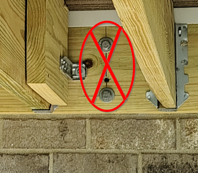 deck ledger attached to brick veneer improper ledger installation that fails inspection