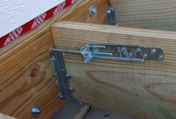 deck lateral load connection requirements tension tie installed between deck and house framing