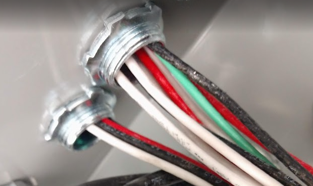 THHN conductors in EMT conduit demonstrating NEC ampacity adjustment rules