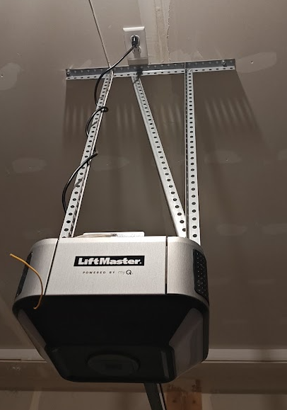 Garage door opener GFCI requirements for a ceiling-mounted receptacle